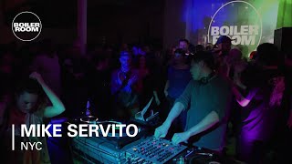 Photo of set Mike Servito.
